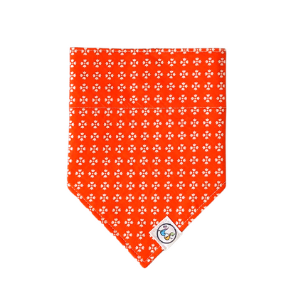 Bright orange bandana with white floral design, adding a pop of color and style to your pet's ensemble.