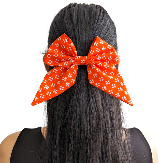 Bright Orange with Whimsical White Floral Sailor Bow