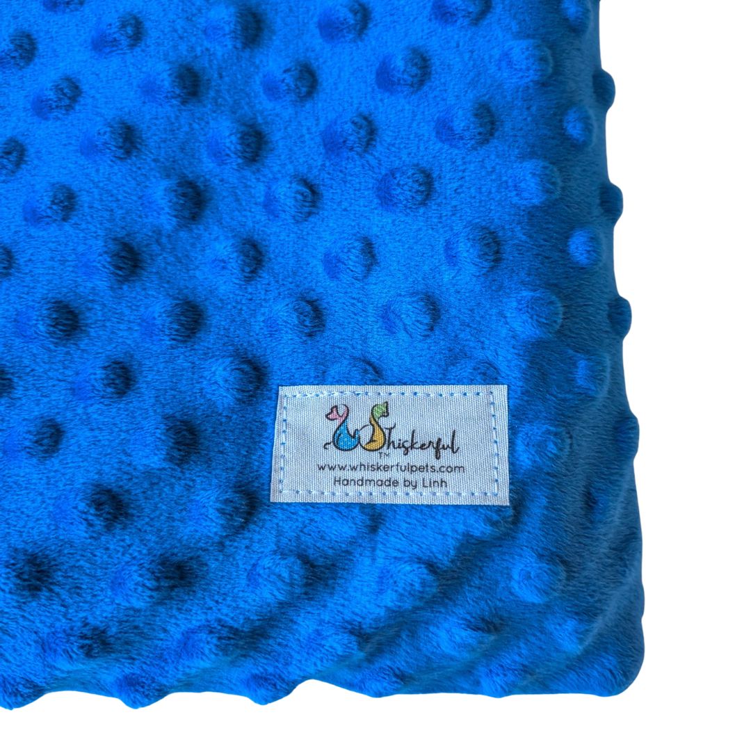 Royal blue burrow bed for cats and small dogs up to 50 lbs with visible brand label
