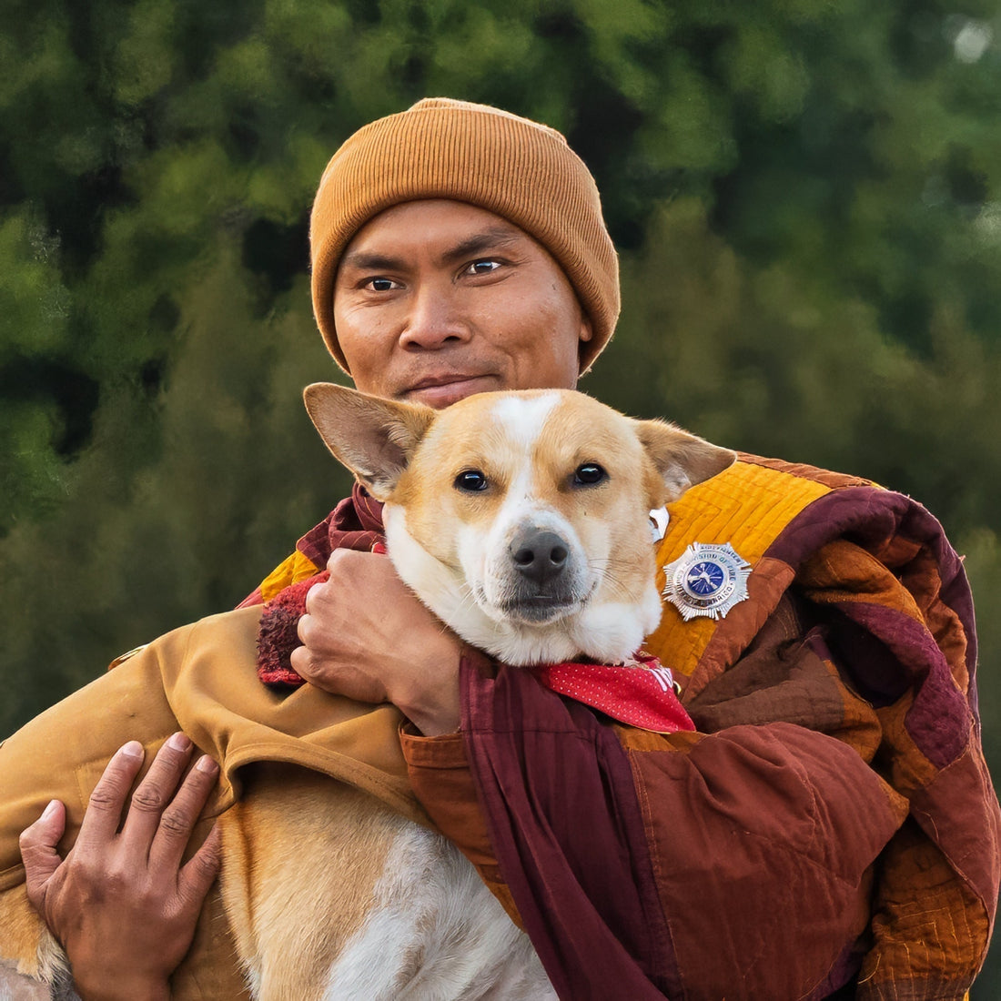 Aloka The Peace Dog held and proud by Venerable Bhikkhu Pannakara 