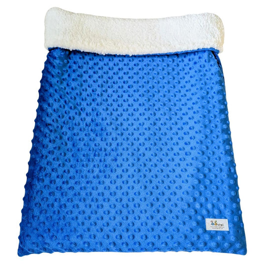 Royal blue faux Sherpa pet bed rolled up for travel or lounging